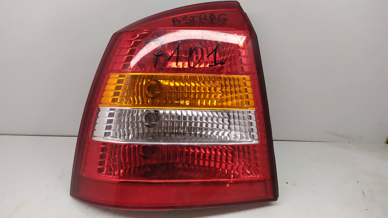 

Фонарь задний левый Opel Astra G 13110929 хетчбек