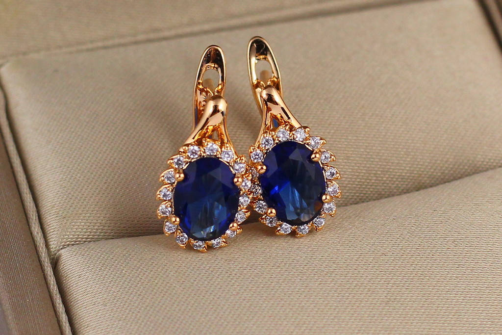 

Серьги Xuping Jewelry малинки с петелькой синий камень 1.5 см золотистые