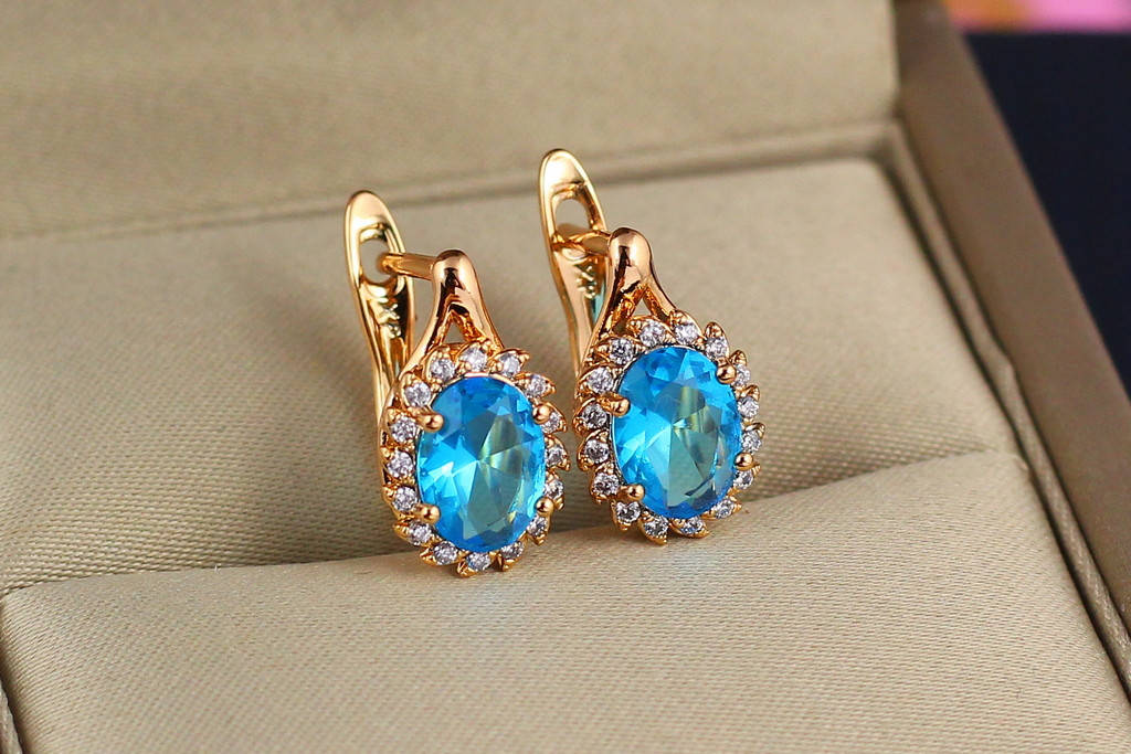 

Серьги Xuping Jewelry малинки с петелькой голубой камень 1.5 см золотистые