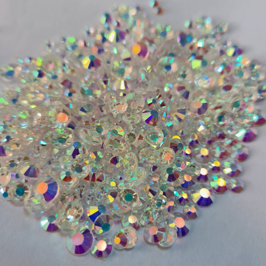 

Стразы микс размеров ss12, 16, 20, 30 Transparent AB 1400шт "Crystal Premium"