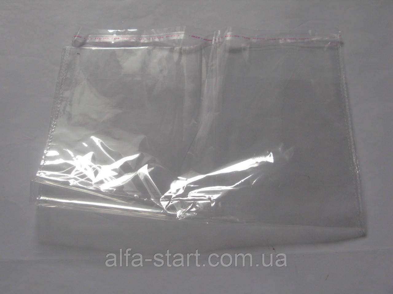 Пакеты прозрачные 200/300мм для упаковки одежды с липким клейкой лентой - фото 2 - id-p40955530