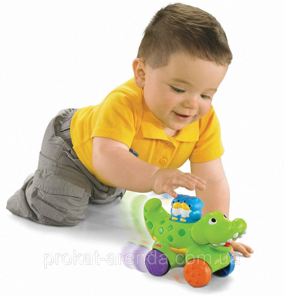 Іграшка "Алігатор" від Fisher-Price для стимуляції повзання