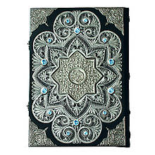 Коран на арабській мові в шкіряній палітурці прикрашений литтям покритим сріблом і топазами