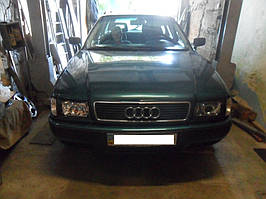 Установка биксеноновых линз Moonlight Evo2 с диодными глазами на Ауди 80