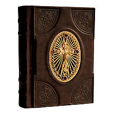Православний молитвослов в шкіряній палітурці прикрашений хрестом, золотий філігранню і гранатами
