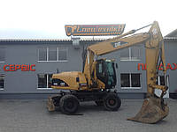 Колесный экскаватор Caterpillar M316C 2006 года