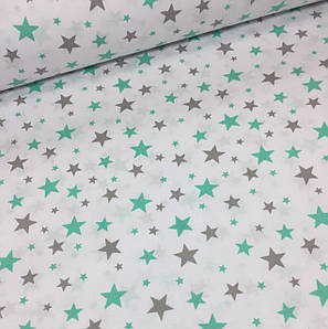 Бавовняна тканина польська зірки сіро-м'ятні великі та маленькі на білому (0210)