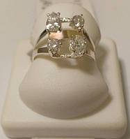 Серебряное кольцо с золотом и белыми цирконами Виток