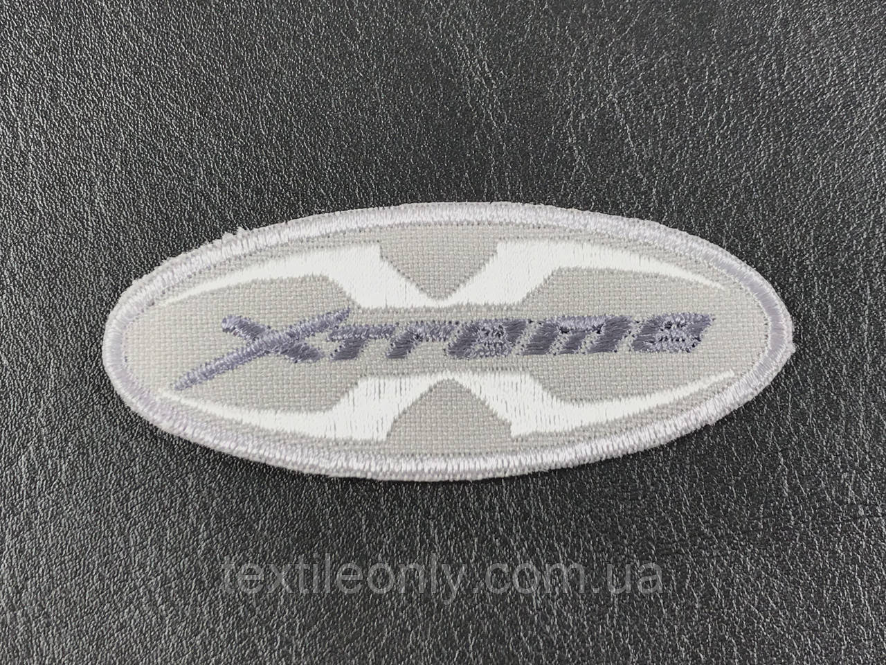 Нашивка Xtreme колір світло-сірий 70x30 мм