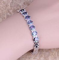 Жіночий браслет у серебрі на руку з містик топазом