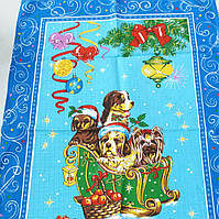 Готове вафельний рушник Новорічне з собачками в санях на блакитному 47х70 см