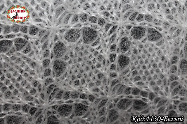 белой ажурной паутинки