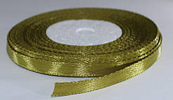Стрічка атласна. Колір — гірчичний. Ширина — 0,7 см, довжина — 23 м