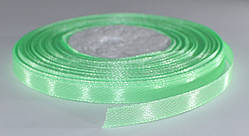 Стрічка атласна. Колір — зелений весняний. Ширина — 0,7 см, довжина — 23 м