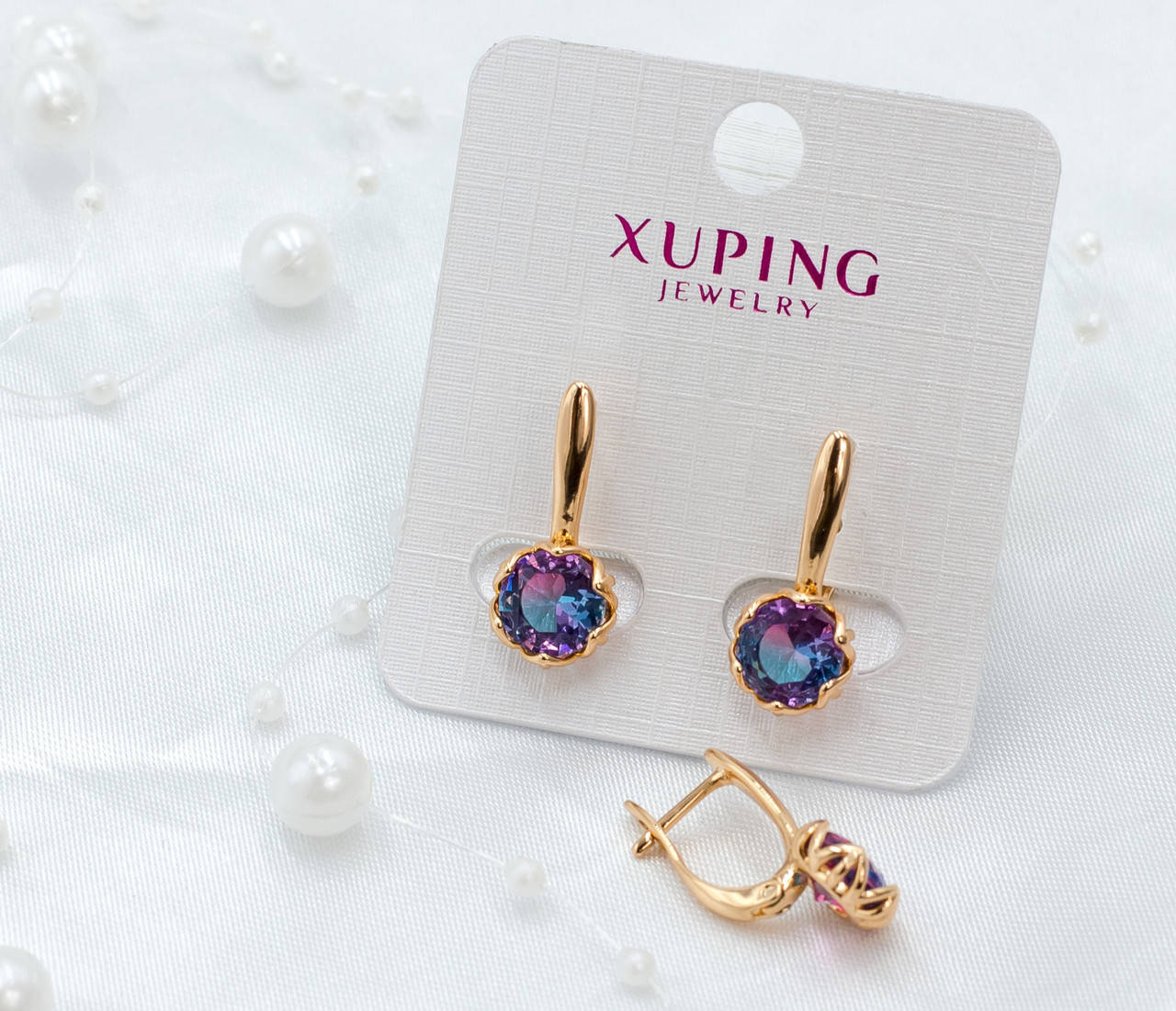 

Серьги Xuping с лиловымы фианитами - позолота 18К, высота 20мм, ширина 10мм.