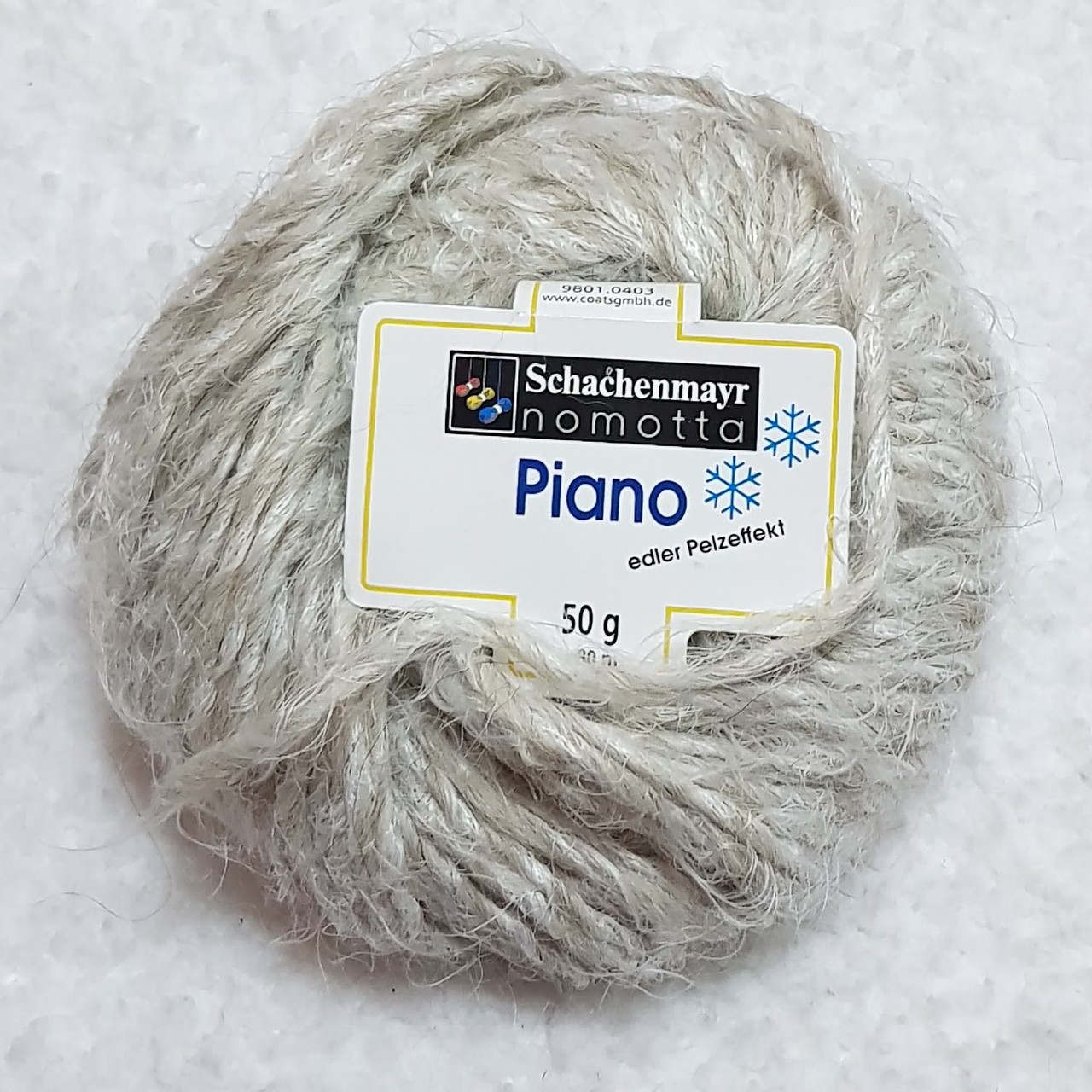 42% альпака 18% вовна 40% поліамід пряжа Piano Schachenmayr nomotta Німеччина 50 г-80 м, колір Меланж бежево-сірий Спиці 6-7 мм