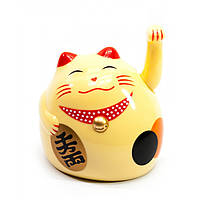 Кошка Манэки-нэко машущая лапой кремовая 9х8х7,5см пластик (27863A)
