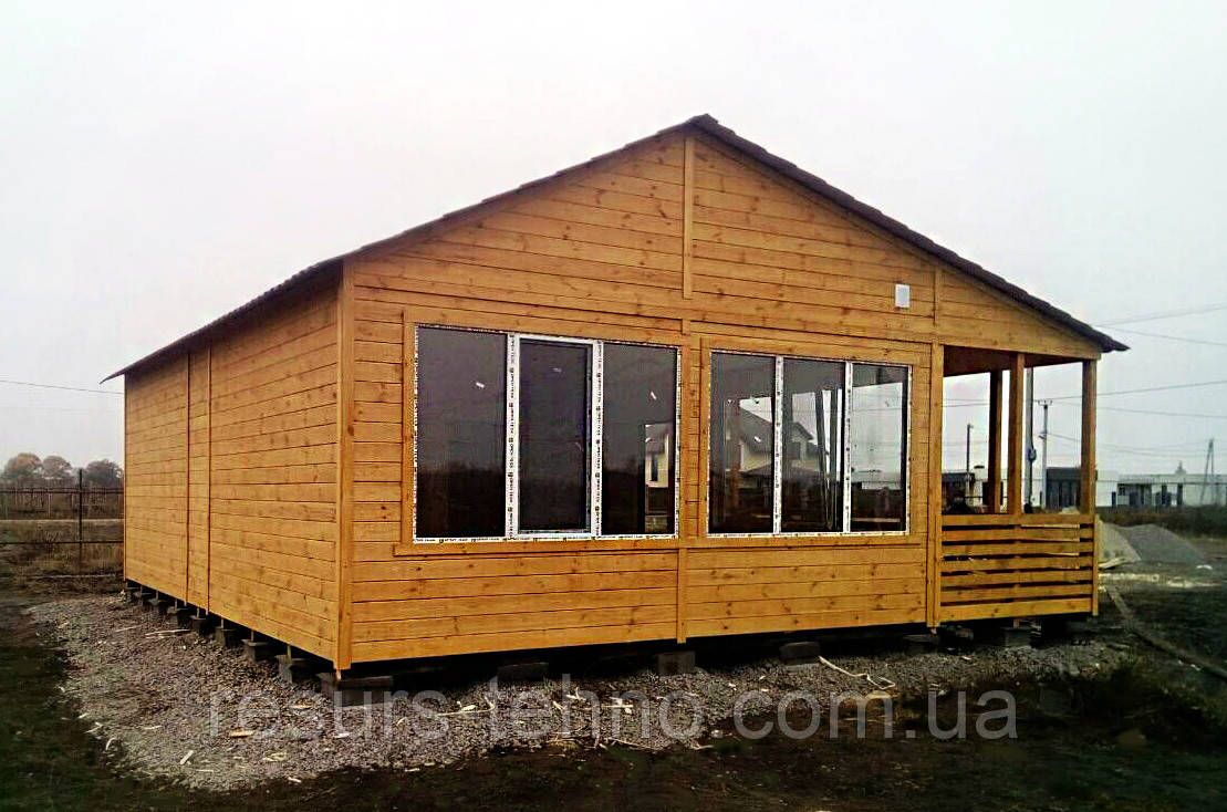 Модульний дачний будинок 9 м х 6 м із фальшбруса з терасою