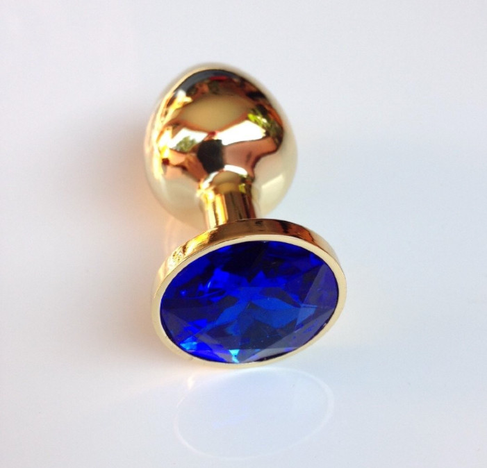 Золота анальна пробка із синім кристалом у чохлі 2.8*7 см Металева