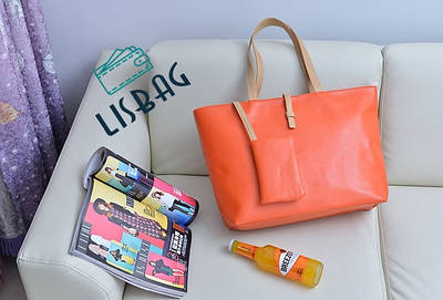 Жіноча сумка оранжевого кольору, місткий для міста або господарства