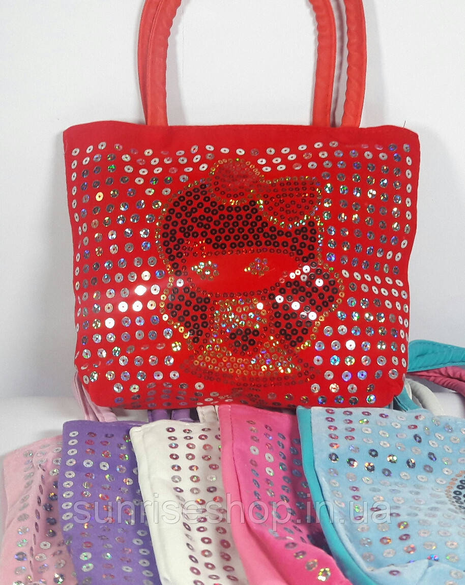 Дитяча сумочка біла в паєтки коротка ручка