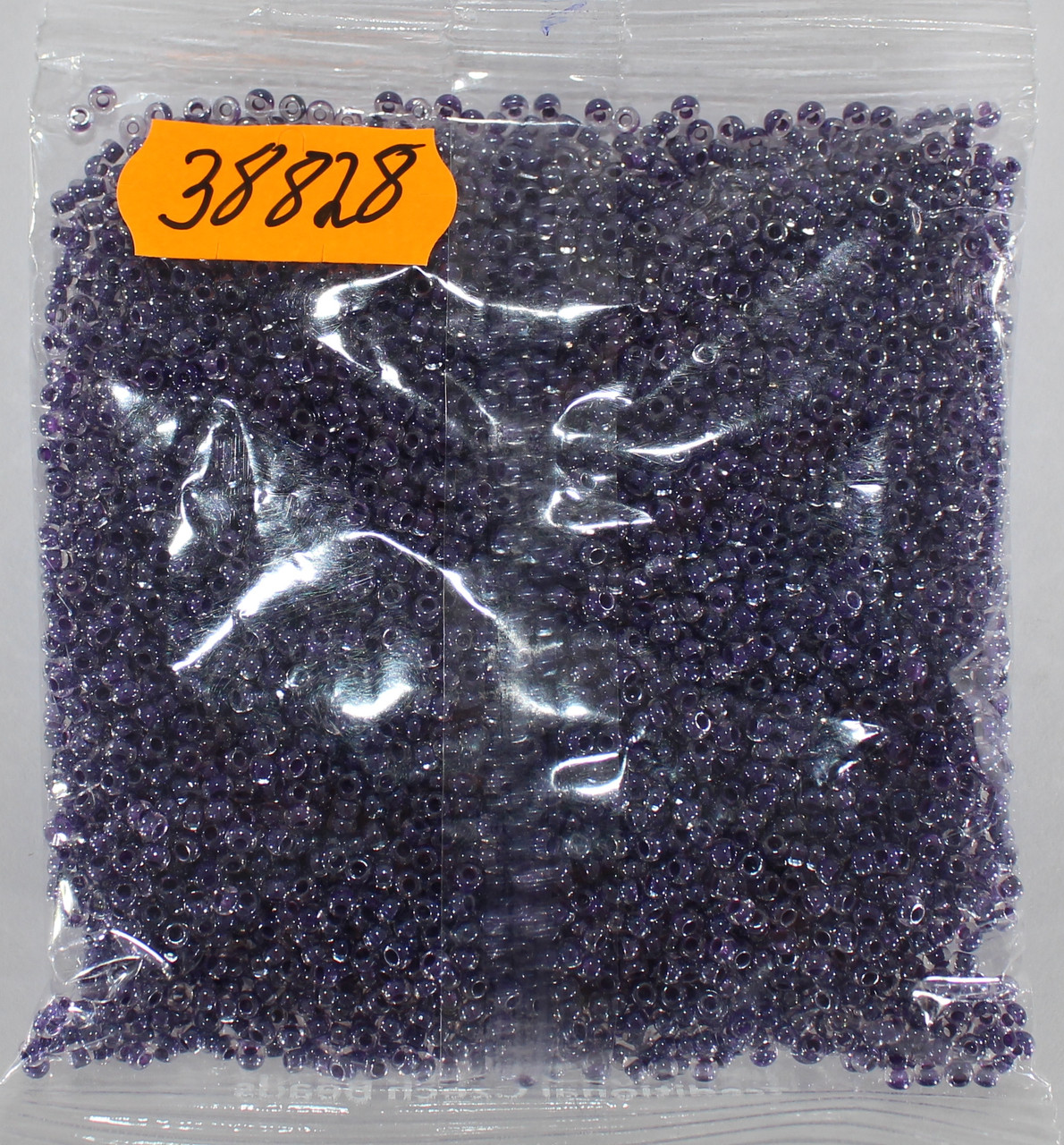 Бісер 10/0, No38828 фіолетовий, пофарбований усередині (пач.50 грамів)