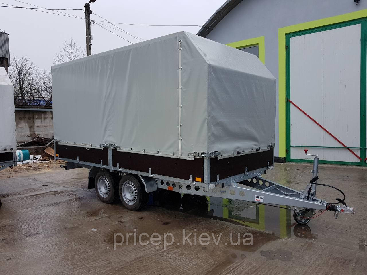 Причіп для перевезення негабаритних вантажів із бортами тентований. Два гальмівні торсіони 1500 кг.