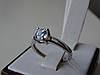 Серебряное родированное кольцо с белым камнем