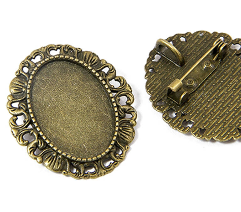 

Основа для броши - кулона Сеттинг под кабошон овальная бронза 34х30 мм кабошон 25х18 мм