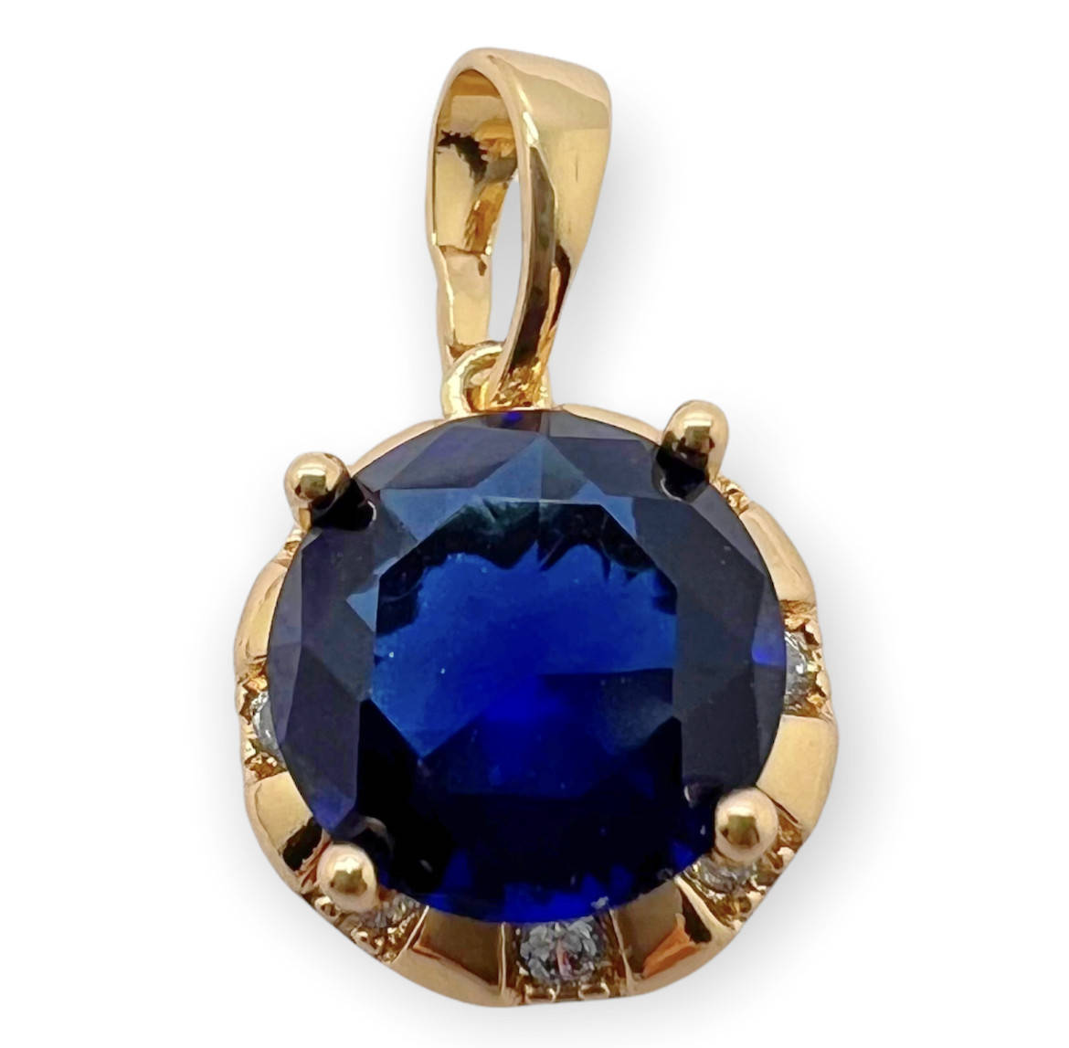 

Кулон с синим камнем xp. 18k