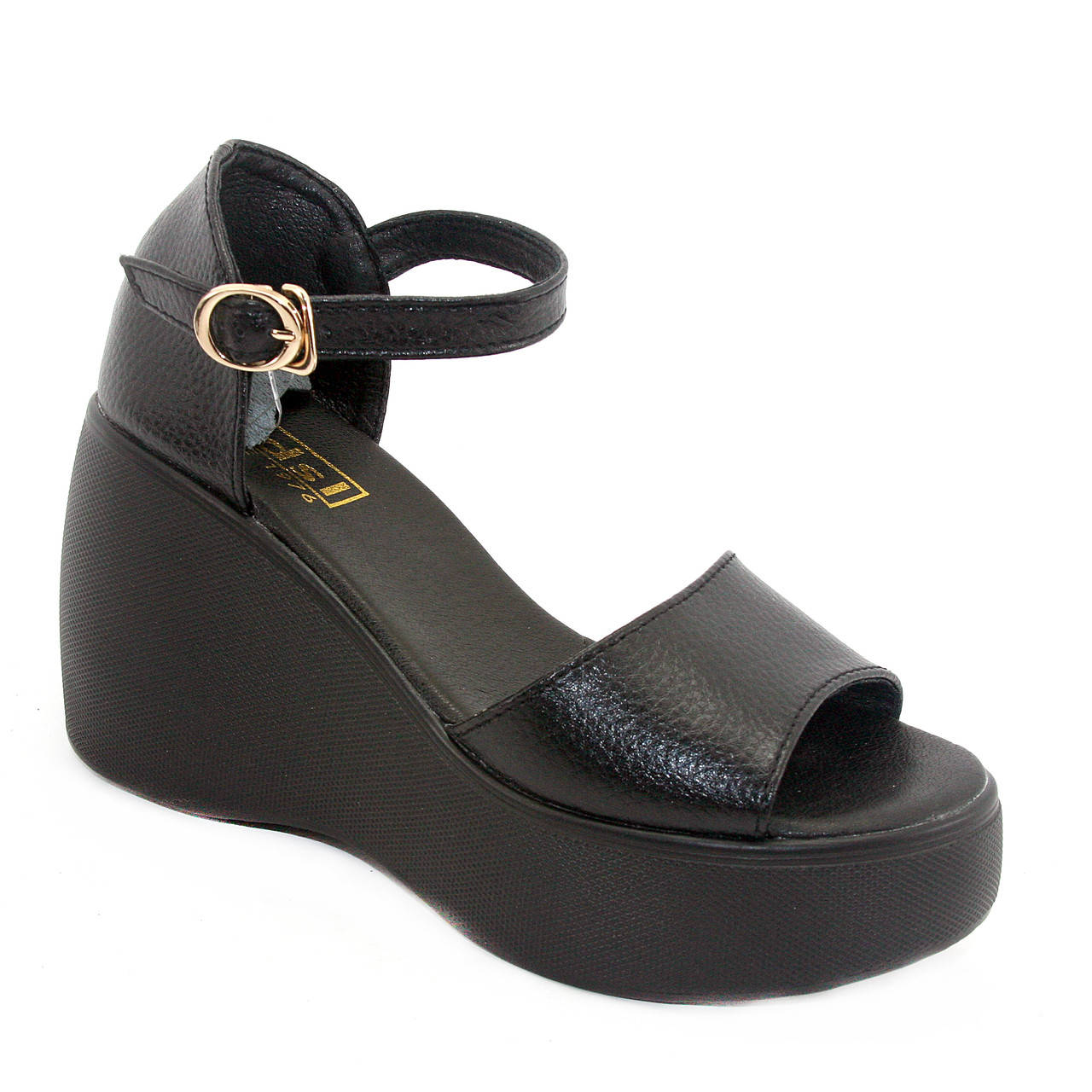 

Босоножки женские черного цвета на высокой танкетке с закрытой пяткой из натуральной кожи