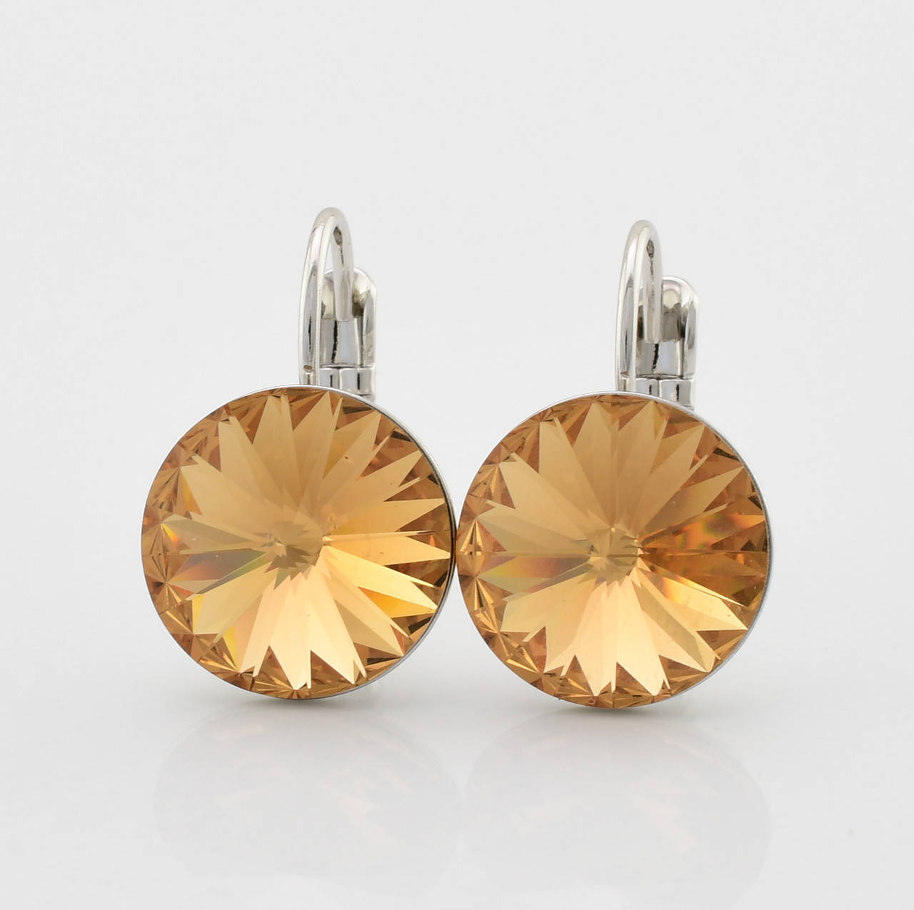 

Серьги Xuping с кристаллами Swarovski 83153 размер 19х12 мм цвет дымчатый топаз позолота Белое Золот