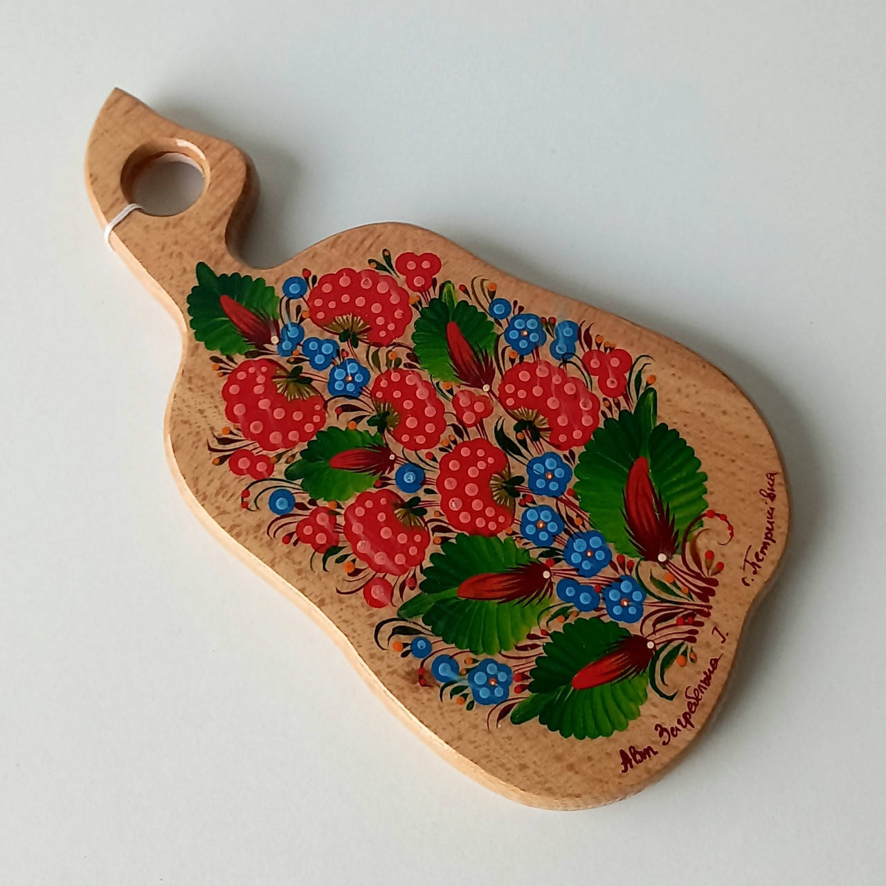 

Доска разделочная расписанная петриковская роспись (груша) , 12,5×23×1,5 см.