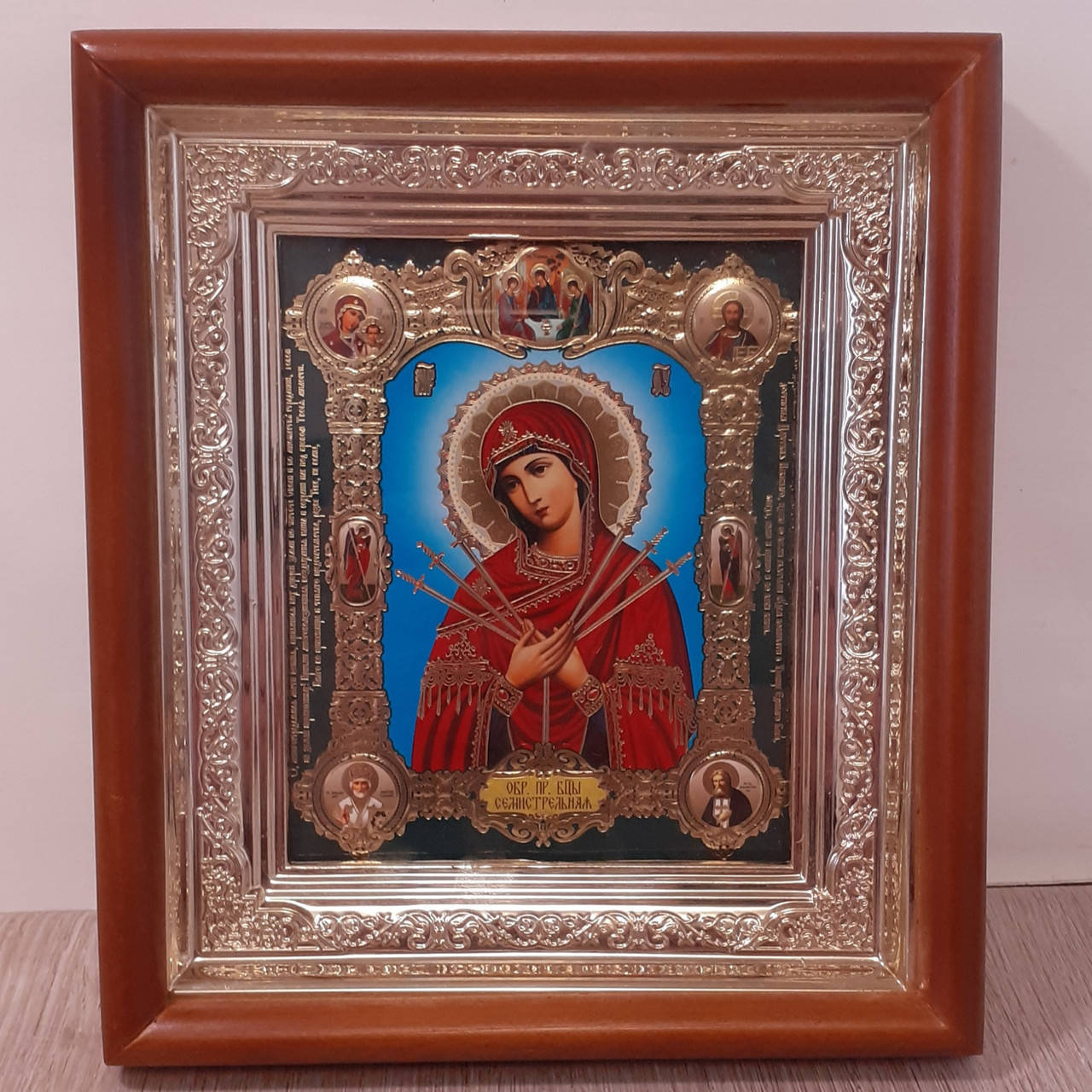 

Икона Пресвятая Богородица Семистрельная, лик 10х12 см, в светлом прямом деревянном киоте