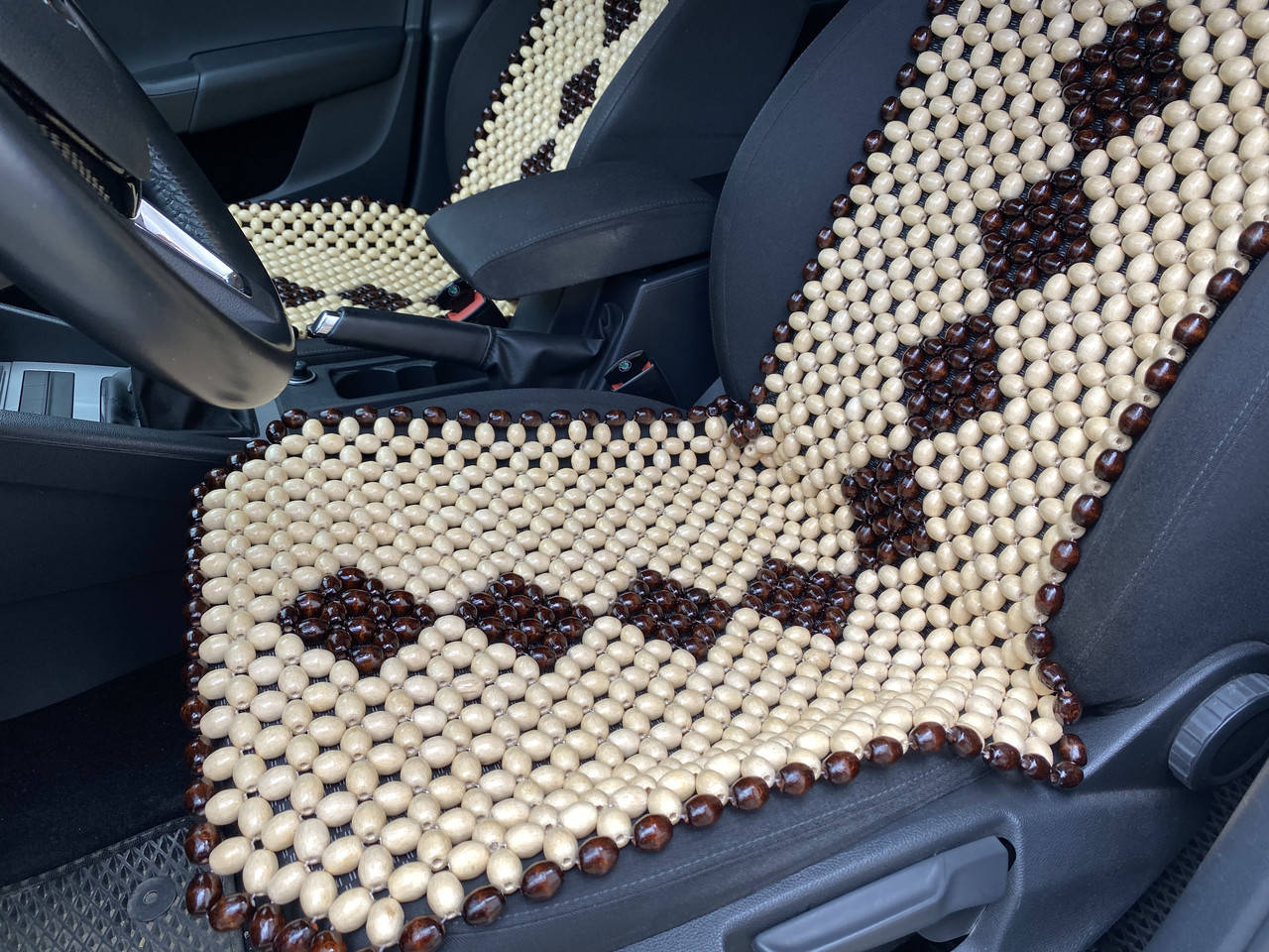 

Деревянная автомассажная накидка на сиденье автомобиля.