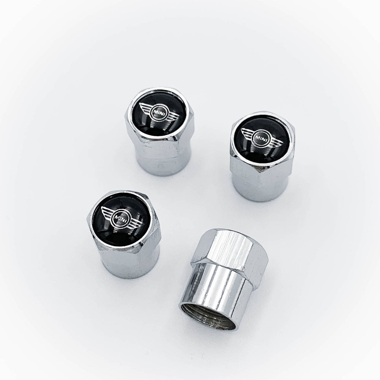 

Защитные колпачки на ниппеля MINI (Мини) Cooper One S R50 R53 R56 R60 F55 F56 4 шт Крылья Cеребристые