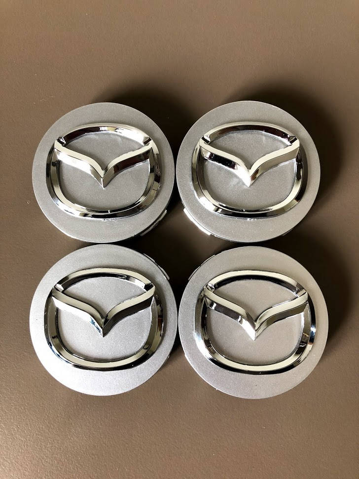 

Колпачки Заглушки Mazda 56мм Серебро