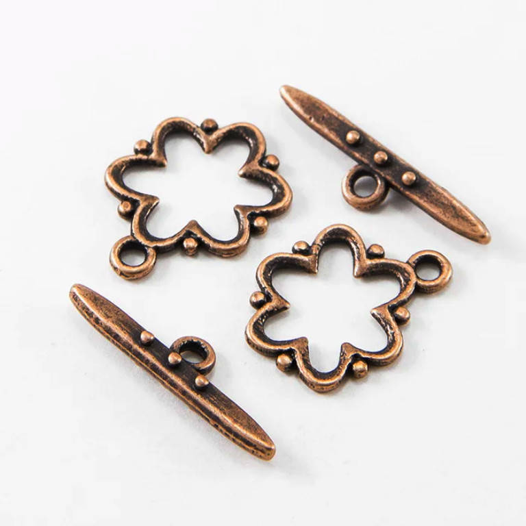 

Замок тогл Цветок медь 19х15 мм