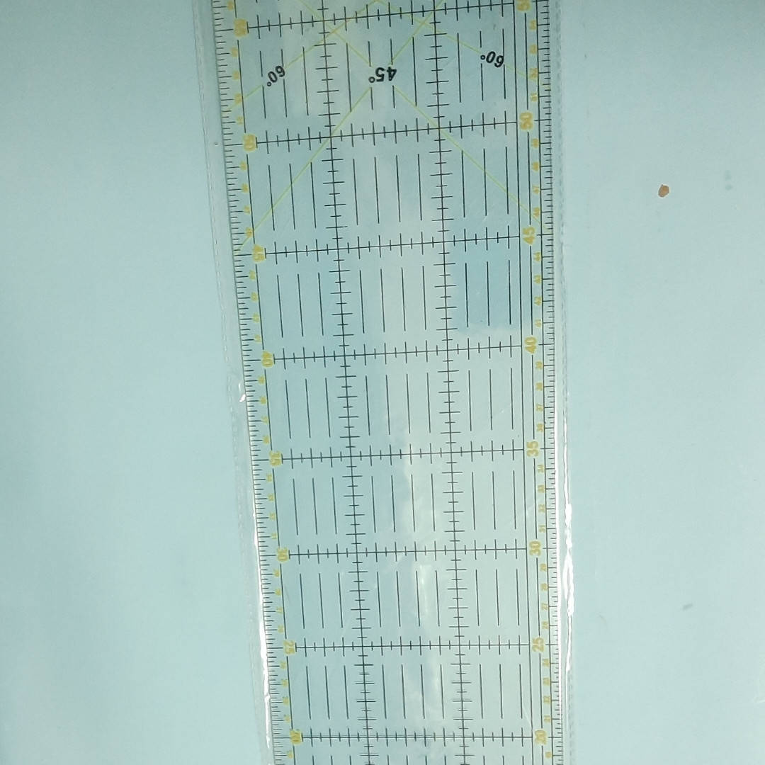 

Линейка лекало для печворка 60×15 см из нескользящей пластмассы