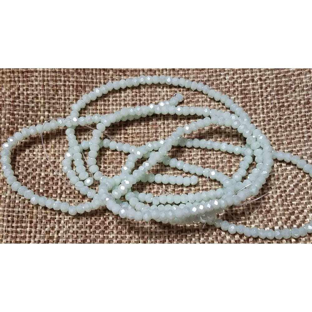 

Хрустальные бусины(рондель). Размер 2 мм. В упаковке прим.190 шт. цвет - мятный с переливом