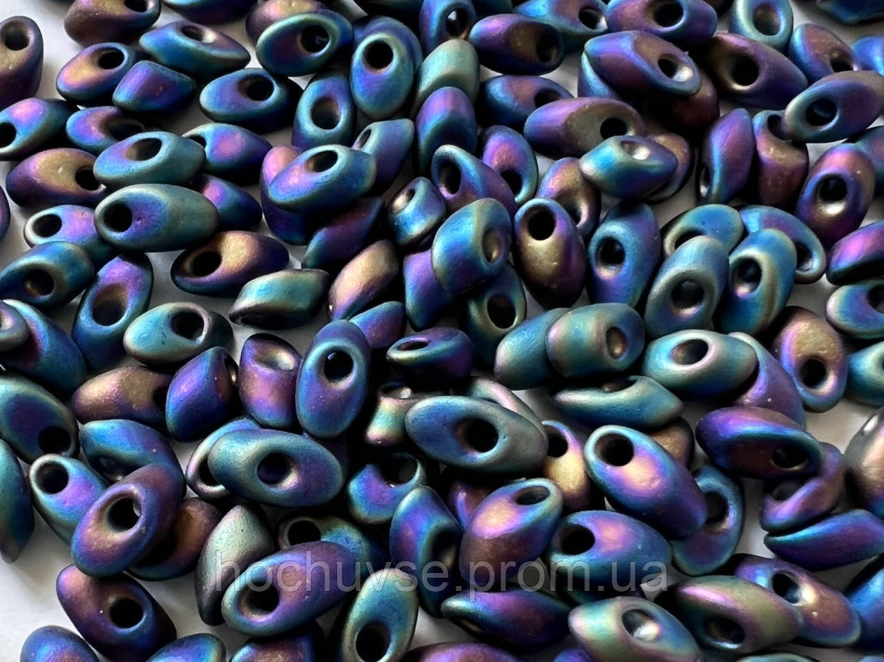 

Miyuki Long Magatama (LMA) 4 x 7 mm 401FR Matted Multi Iris