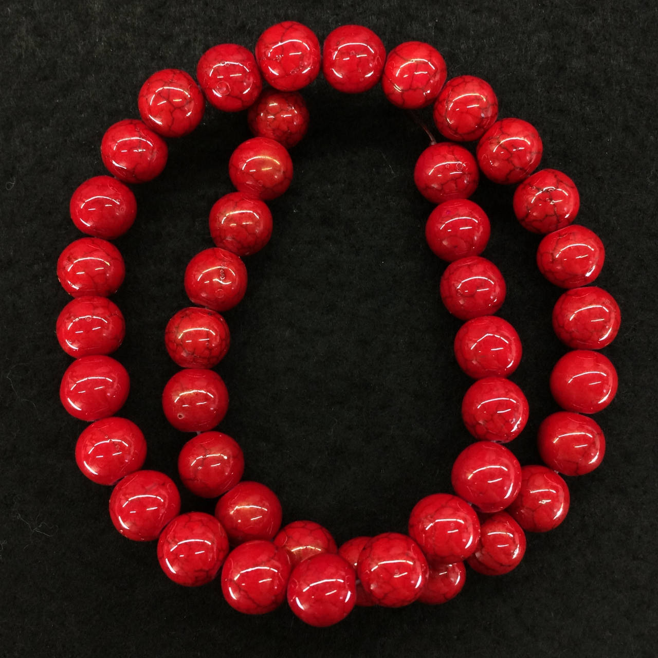 

Бусины на нитке натуральный камень Говлит (им. коралла) гладкий шарик d=10мм