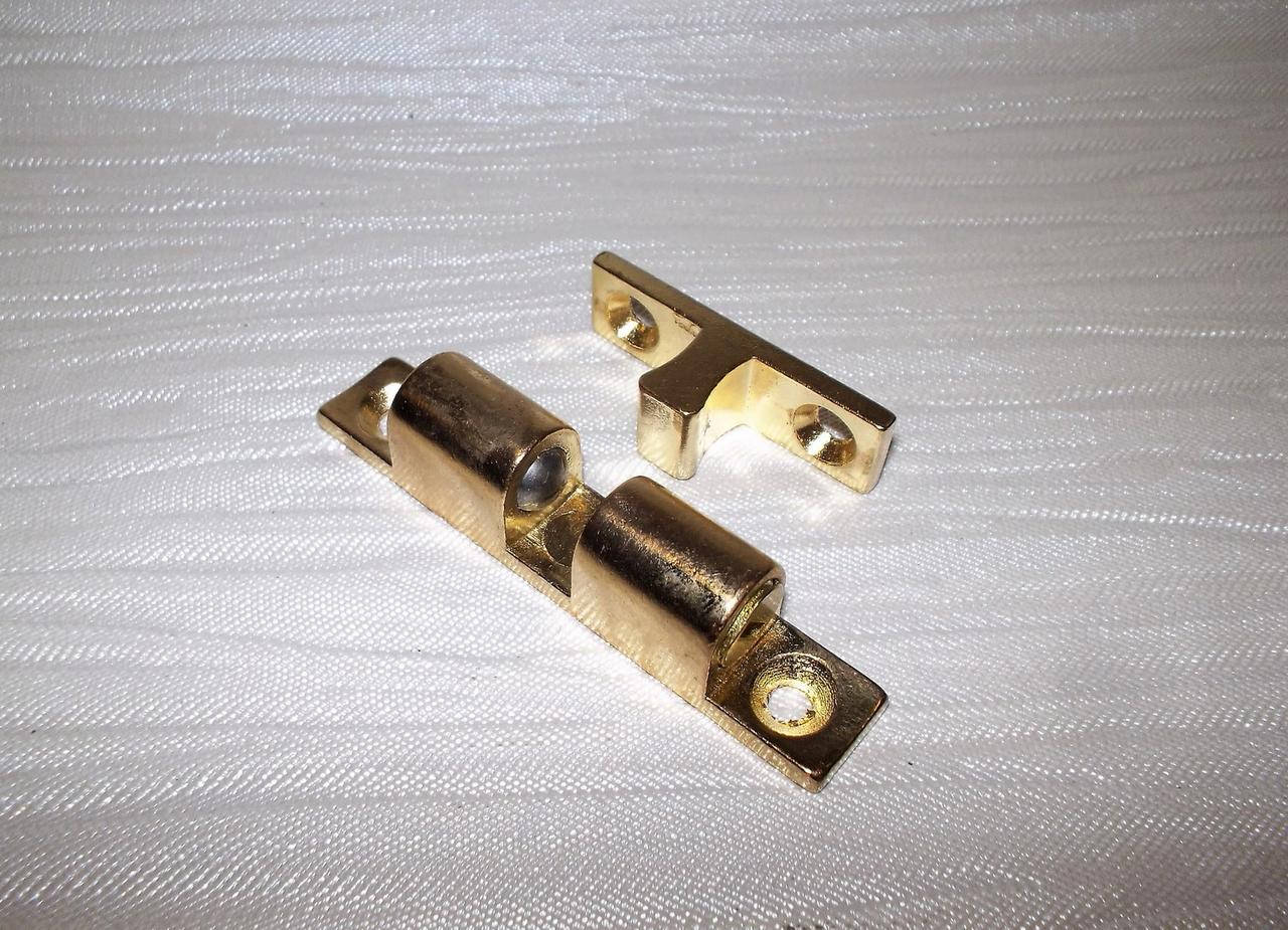 

Защёлка мебельная латунь 60мм