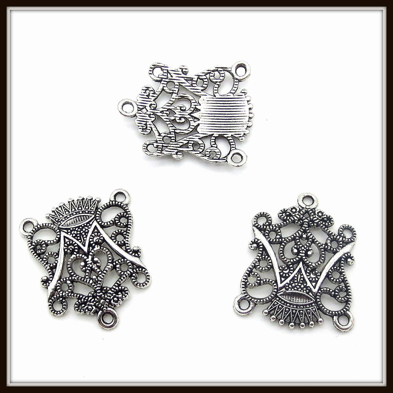 

Коннектор "фигурный" серебро (2х2,4 см) 8 шт в уп.