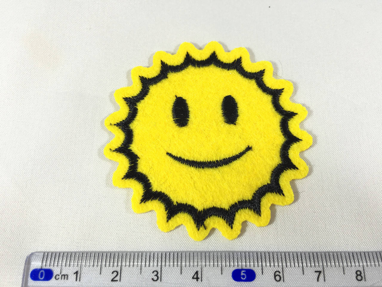 

Нашивка смайл солнышко 60 мм
