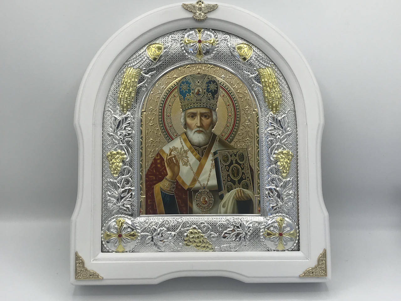 

Икона Св. Николая в рамке из дерева