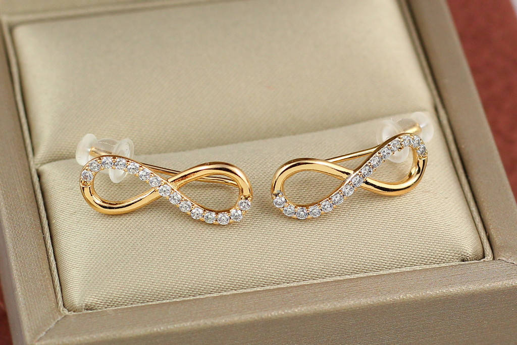 

Серьги каффы Xuping Jewelry бесконечность 2 см золотистые