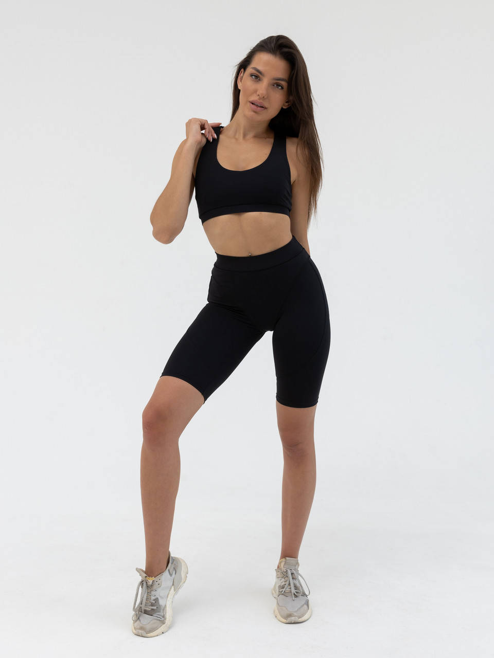 

Спортивный женский комплект - топ и велосипедки Push-up - черный