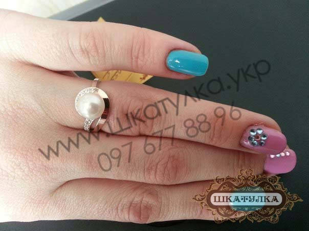 

Серебряное кольцо с золотом и жемчугом