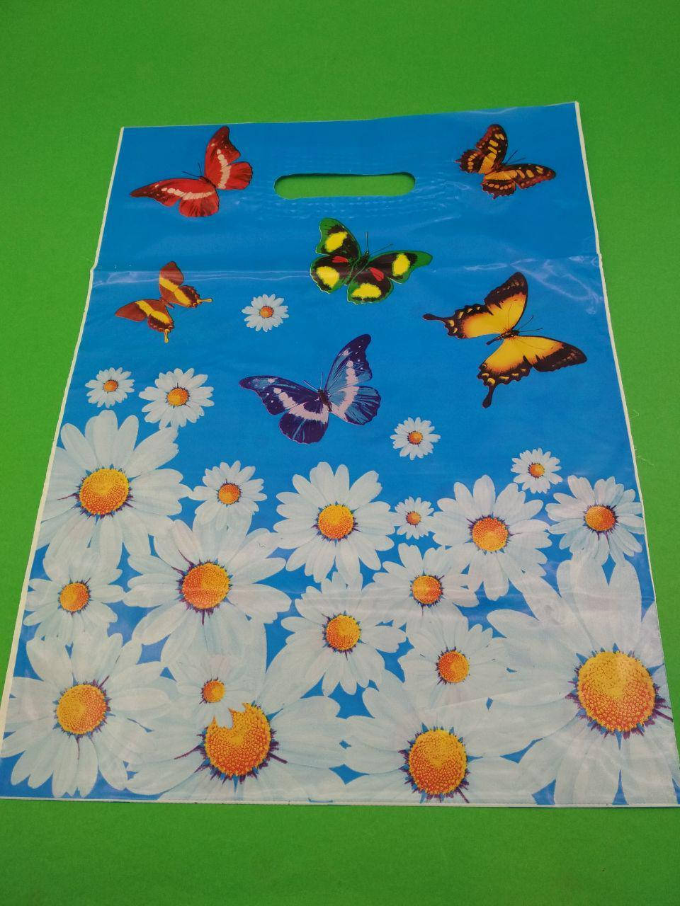 

Пакет с прорезной ручкой тип банан(30*40,5) "Бабочки ромашки" (50 шт)Полиэтиленовые пакеты сумки кульки